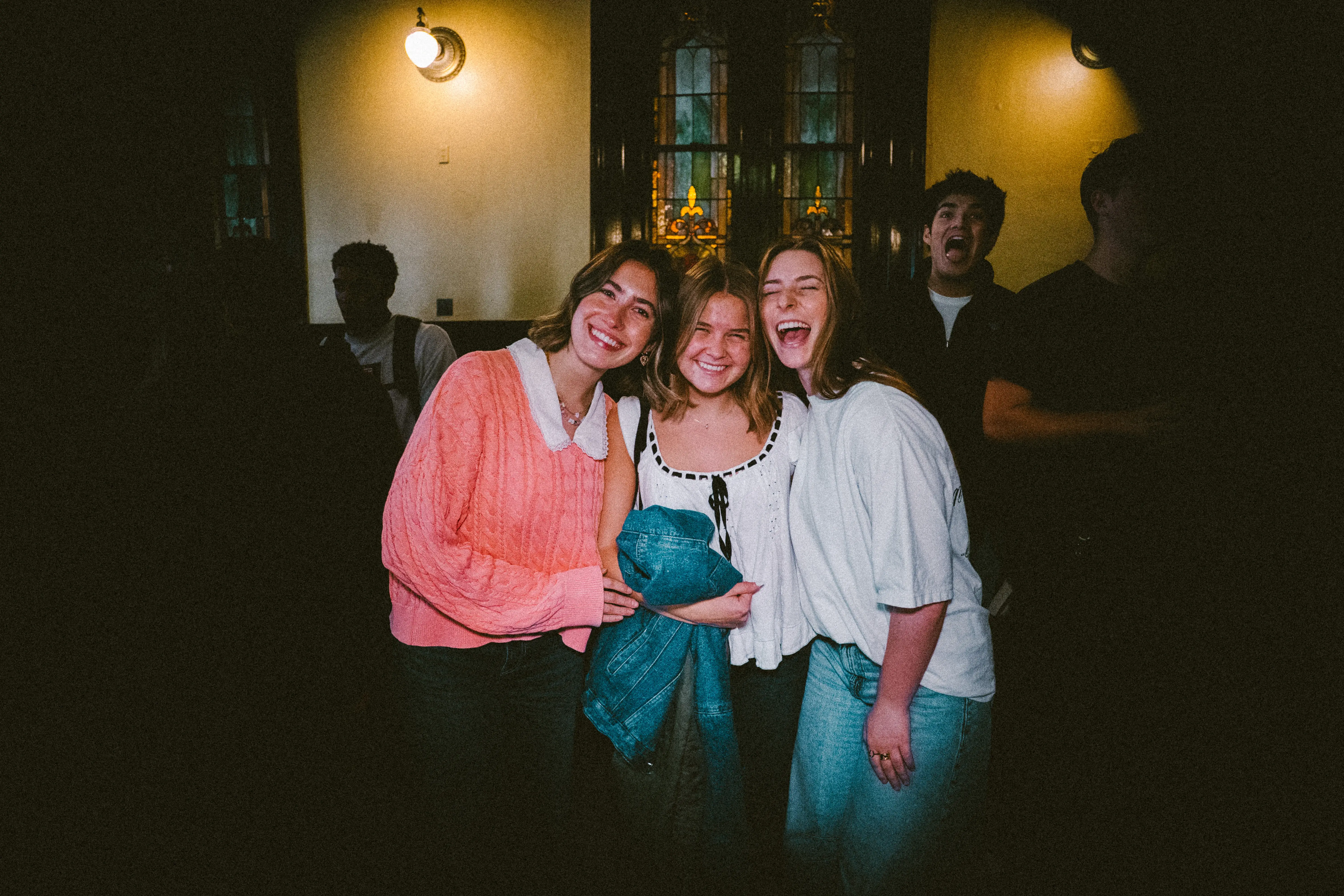 Friends laughing together after Monday Nights in Nashville